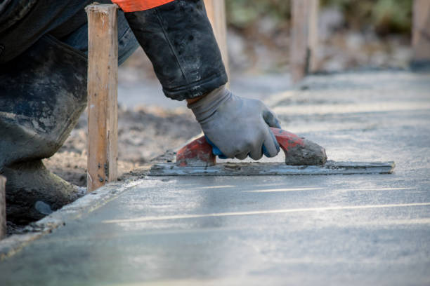 Best Concrete Sidewalk Installation  in Chisholm, MN
